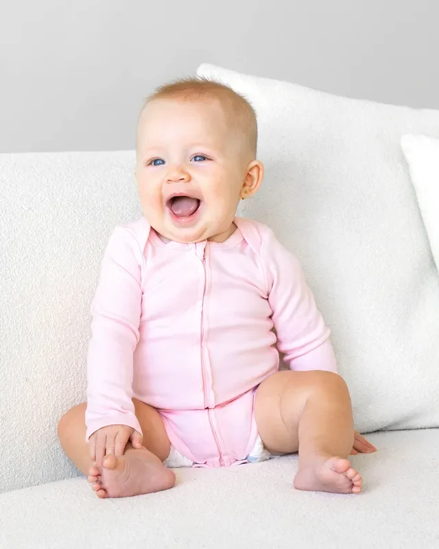 Long Sleeve Zipper Bodysuit In Blush, 0-3m