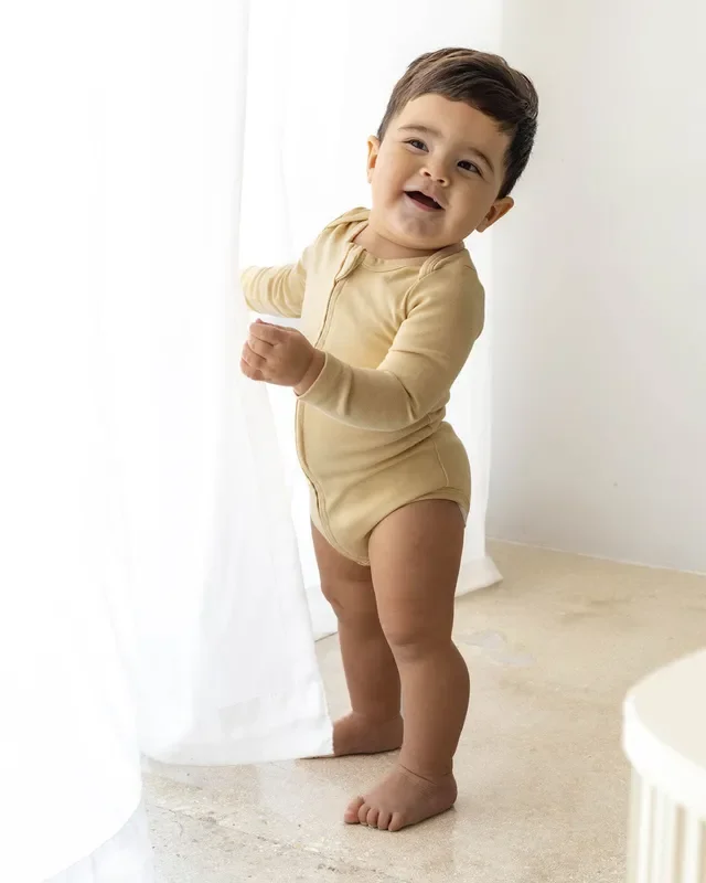 Long Sleeve Zipper Bodysuit In Latte, 9-12m